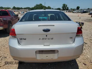 2008 Ford Focus SE z VIN 1FAHP35N78W115746, wystawiony jako Copart lot #60981575 z przebiegiem 195 035 mil mil oraz Czysty tytuł • Clean title. Historia ofert i sprzedaży dostępna na DreamBid. Obrazek 6.