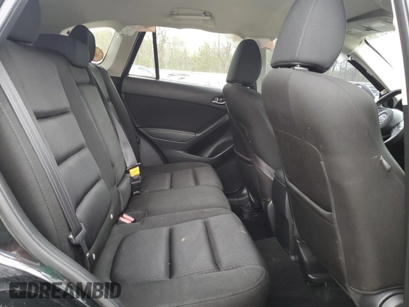 2014 Mazda CX-5 Touring with VIN JM3KE2CY8E0424757, listed as a Copart auction lot 54703195 with 111,401 mi miles and Salvage Title. Bid and sale history available at DreamBid. Image 11.