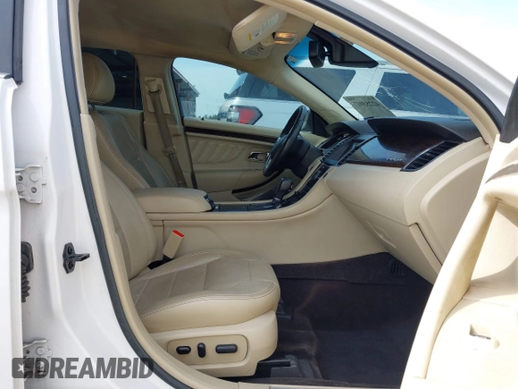 2015 Ford Taurus Limited z VIN 1FAHP2F83FG182936, wystawiony jako IAAI lot #42255917 z przebiegiem 138 966 mil mil oraz . Historia ofert i sprzedaży dostępna na DreamBid. Obrazek 5.