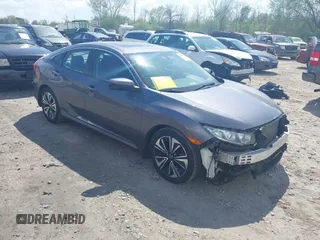 2017 Honda Civic EX-L z VIN 19XFC1F73HE025263, wystawiony jako IAAI lot #42265487 z przebiegiem 142 976 mil mil oraz . Historia ofert i sprzedaży dostępna na DreamBid. Obrazek 1.