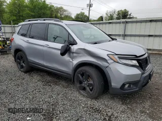 2019 Honda Passport Elite z VIN 5FNYF8H07KB030315, wystawiony jako Copart lot #55330725 z przebiegiem 45 954 mil mil oraz Szkody całkowita. Historia ofert i sprzedaży dostępna na DreamBid. Obrazek 4.