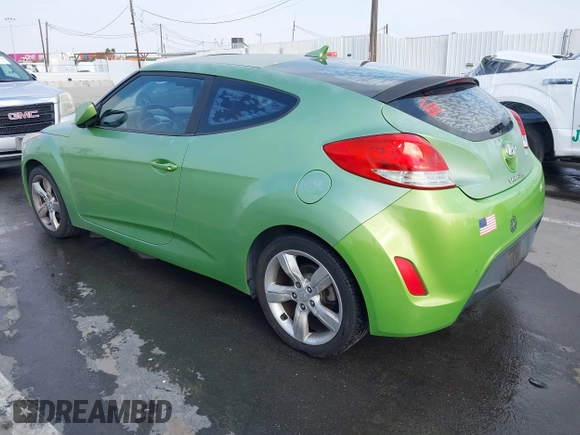 2012 Hyundai Veloster w/Gray Int z VIN KMHTC6AD3CU025315, wystawiony jako IAAI lot #42097741 z przebiegiem 146 726 mil mil oraz . Historia ofert i sprzedaży dostępna na DreamBid. Obrazek 3.