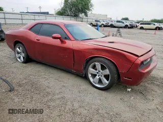 2013 Dodge Challenger SXT z VIN 2C3CDYAG3DH645792, wystawiony jako Copart lot #57351105 z przebiegiem 170 572 mil mil oraz Szkoda całkowita • Salvage title. Historia ofert i sprzedaży dostępna na DreamBid. Obrazek 4.