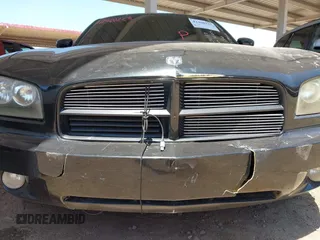2007 Dodge Charger z VIN 2B3KA43R27H671197, wystawiony jako IAAI lot #42400223 z przebiegiem 180 948 mil mil oraz . Historia ofert i sprzedaży dostępna na DreamBid. Obrazek 6.