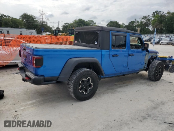 2022 Jeep Gladiator Rubicon with VIN 1C6JJTBG4NL111323, listed as a Copart auction lot 58772405 with 25,997 mi miles and Salvage title. Bid and sale history available at DreamBid. Image 3.