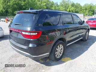 2015 Dodge Durango SXT with VIN 1C4RDJAG4FC795963, listed as a IAAI auction lot 42457196 with 161,800 mi miles and . Bid and sale history available at DreamBid. Image 4.
