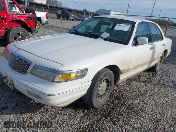 1997 Mercury Grand Marquis LS with VIN 2MELM75W5VX715872, listed as a IAAI auction lot 41612631 with 202,743 mi miles and . Bid and sale history available at DreamBid. Image 2.