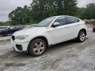 2014 BMW X6 xDrive35i z VIN 5UXFG2C5XE0C43042, wystawiony jako Copart lot #56151565 z przebiegiem Nie podano mil oraz Tytuł czysty. Historia ofert i sprzedaży dostępna na DreamBid. Obrazek 1.