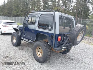 2004 Jeep Wrangler X z VIN 1J4FA39S44P725251, wystawiony jako IAAI lot #42249845 z przebiegiem 136 454 mil mil oraz . Historia ofert i sprzedaży dostępna na DreamBid. Obrazek 3.