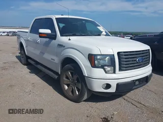 2011 Ford F-150 XLT with VIN 1FTFW1CTXBKD70447, listed as a IAAI auction lot 42567152 with 215,163 mi miles and . Bid and sale history available at DreamBid. Image 1.