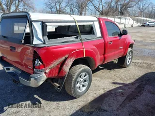 2009 Toyota Tacoma with VIN 5TEPX42N59Z608135, listed as a IAAI auction lot 41752034 with 163,452 mi miles and . Bid and sale history available at DreamBid. Image 4.