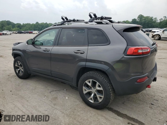 2014 Jeep Cherokee Trailhawk z VIN 1C4PJMBS9EW159721, wystawiony jako Copart lot #60719525 z przebiegiem 136 807 mil mil oraz Szkoda całkowita • Salvage title. Historia ofert i sprzedaży dostępna na DreamBid. Obrazek 2.