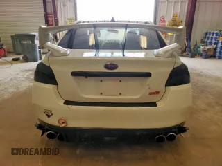 2015 Subaru WRX STI z VIN JF1VA2L68F9832260, wystawiony jako Copart lot #63236905 z przebiegiem 136 032 mil mil oraz Czysty tytuł • Clean title. Historia ofert i sprzedaży dostępna na DreamBid. Obrazek 6.