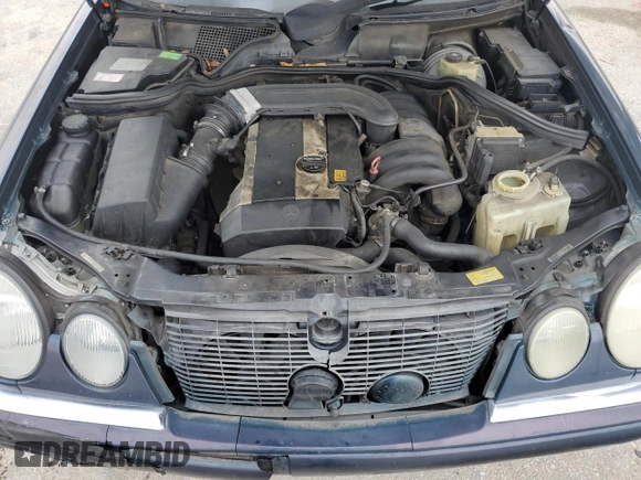 1997 Mercedes-Benz E-Class with VIN WDBJF55F4VJ025769, listed as a Copart auction lot 73460164 with 0 mi miles and Salvage Title. Bid and sale history available at carsss.com. Image 12.