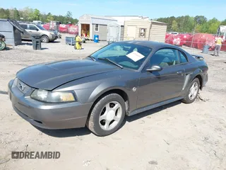 2004 Ford Mustang Standard z VIN 1FAFP40644F236905, wystawiony jako IAAI lot #42016081 z przebiegiem 167 733 mil mil oraz . Historia ofert i sprzedaży dostępna na DreamBid. Obrazek 17.