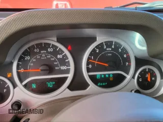 2010 Jeep Wrangler Unlimited Sahara with VIN 1J4BA5H10AL117474, listed as a IAAI auction lot 41969202 with 131,256 mi miles. Bid and sale history available at carsss.com. Image 10.
