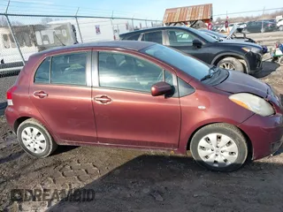 2009 Toyota Yaris with VIN JTDKT903X95258654, listed as a IAAI auction lot 41759756 with 93,810 mi miles. Bid and sale history available at carsss.com. Image 13.