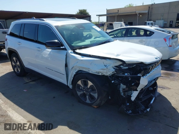 2022 Jeep Grand Cherokee with VIN 1C4RJYB66N8718018, listed as a IAAI auction lot 42002051 with Not provided miles and . Bid and sale history available at DreamBid. Image 1.