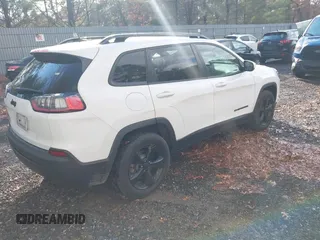 2019 Jeep Cherokee Latitude Plus with VIN 1C4PJMLB4KD321809, listed as a IAAI auction lot 40982234 with 132,496 mi miles. Bid and sale history available at carsss.com. Image 4.
