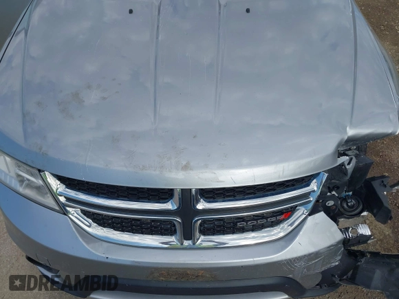 2017 Dodge Journey SXT z VIN 3C4PDDBG6HT595309, wystawiony jako IAAI lot #41918029 z przebiegiem 127 247 mil mil oraz . Historia ofert i sprzedaży dostępna na DreamBid. Obrazek 17.