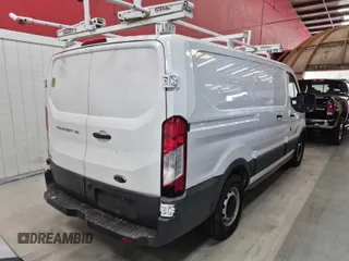 2016 Ford Transit Cargo with VIN 1FTYE1ZM1GKA06047, listed as a IAAI auction lot 42737717 with 124,601 mi miles and . Bid and sale history available at DreamBid. Image 7.