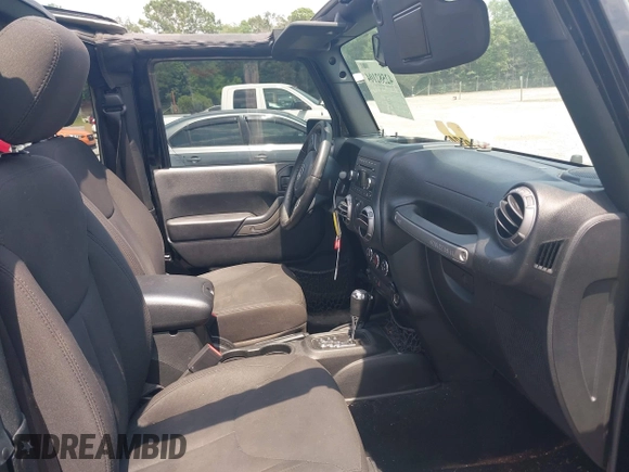 2017 Jeep Wrangler Sport z VIN 1C4AJWAG0HL618140, wystawiony jako IAAI lot #42582104 z przebiegiem 77 883 mil mil oraz . Historia ofert i sprzedaży dostępna na DreamBid. Obrazek 5.