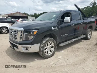 2017 Nissan Titan SL z VIN 1N6AA1F47HN500895, wystawiony jako Copart lot #56812615 z przebiegiem Nie podano mil oraz Szkoda całkowita • Salvage title. Historia ofert i sprzedaży dostępna na DreamBid. Obrazek 1.