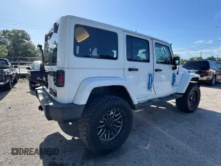 2012 Jeep Wrangler Unlimited Altitude z VIN 1C4HJWEG5CL222948, wystawiony jako Copart lot #61101825 z przebiegiem 106 991 mil mil oraz Czysty tytuł • Clean title. Historia ofert i sprzedaży dostępna na DreamBid. Obrazek 4.
