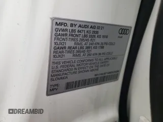 2021 Audi Q8 Premium z VIN WA1AVAF14MD028288, wystawiony jako Copart lot #42691223 z przebiegiem 23 508 mil mil oraz . Historia ofert i sprzedaży dostępna na DreamBid. Obrazek 14.