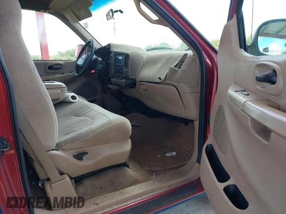 1999 Ford F-150 XL with VIN 1FTRX17L9XNB83680, listed as a IAAI auction lot 42636807 with Not provided miles and . Bid and sale history available at DreamBid. Image 5.