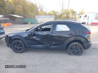 2023 Mazda CX-30 2.5 S Premium Package with VIN 3MVDMBDM5PM536219, listed as a IAAI auction lot 40710444 with 16,863 mi miles. Bid and sale history available at carsss.com. Image 13.