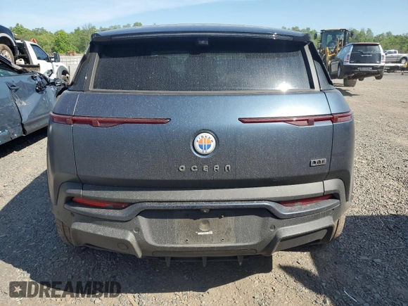 2023 Fisker Ocean One z VIN VCF1ZBU29PG004499, wystawiony jako Copart lot #55474415 z przebiegiem 14 190 mil mil oraz Szkoda całkowita • Salvage title. Historia ofert i sprzedaży dostępna na DreamBid. Obrazek 6.