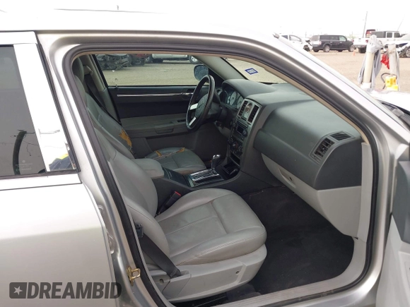 2006 Chrysler 300 Touring with VIN 2C3KA53G36H384442, listed as a IAAI auction lot 41817539 with 129,123 mi miles. Bid and sale history available at carsss.com. Image 5.