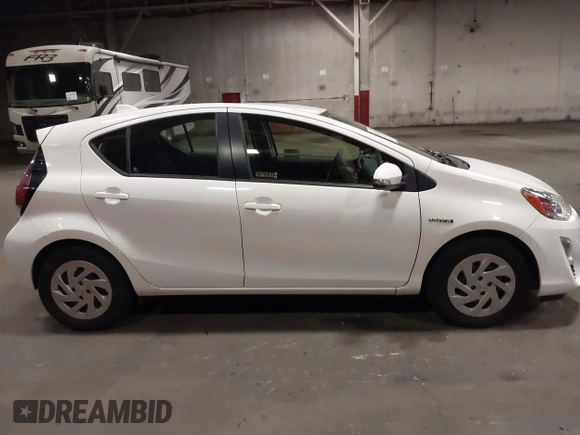 2016 Toyota Prius One z VIN JTDKDTB33G1121647, wystawiony jako IAAI lot #42020194 z przebiegiem 72 535 mil mil oraz . Historia ofert i sprzedaży dostępna na DreamBid. Obrazek 13.