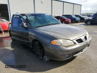 2000 Hyundai Elantra GLS z VIN KMHJF35F6YU912049, wystawiony jako Copart lot #64330472 z przebiegiem 222 733 mil mil oraz Nie do naprawy • Non repairable. Historia ofert i sprzedaży dostępna na DreamBid. Obrazek 1.