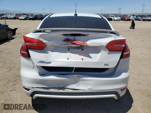 2016 Ford Focus SE с VIN 1FADP3F28GL344469, выставлен на аукционе Copart как лот 57490255 с пробегом 120 658 миль миль и Списание • Salvage title. История ставок и продаж доступна на DreamBid. Изображение 6.