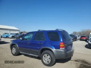 2006 Ford Escape XLT with VIN 1FMYU93136KA51162, listed as a Copart auction lot 52239385 with 227,666 mi miles and Salvage title. Bid and sale history available at DreamBid. Image 2.