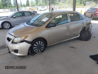 2009 Toyota Corolla with VIN 1NXBU40E79Z049147, listed as a IAAI auction lot 42654211 with 144,504 mi miles and . Bid and sale history available at DreamBid. Image 2.