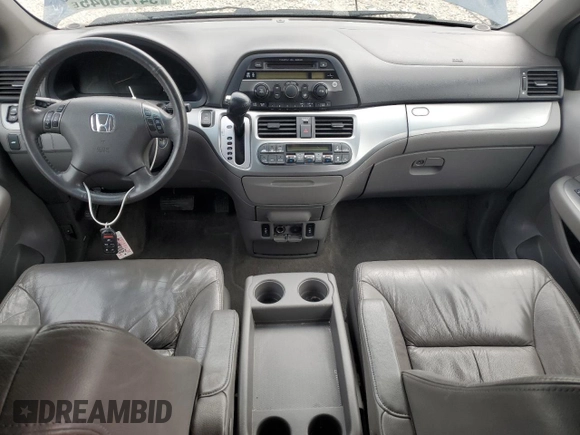2009 Honda Odyssey EX-L with VIN 5FNRL38629B409446, listed as a Copart auction lot 54736045 with 176,229 mi miles and Salvage Title. Bid and sale history available at DreamBid. Image 8.