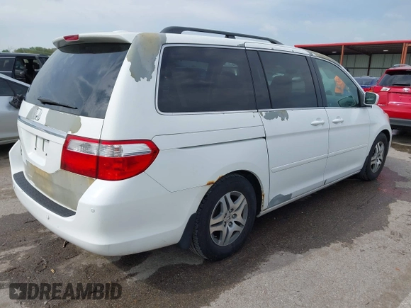 2007 Honda Odyssey Touring with VIN 5FNRL38887B081562, listed as a IAAI auction lot 42000435 with 238,287 mi miles and . Bid and sale history available at DreamBid. Image 4.