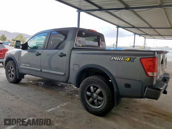 2013 Nissan Titan SV with VIN 1N6AA0EC4DN313935, listed as a Copart auction lot 57950695 with 246,851 mi miles and Salvage title. Bid and sale history available at DreamBid. Image 2.