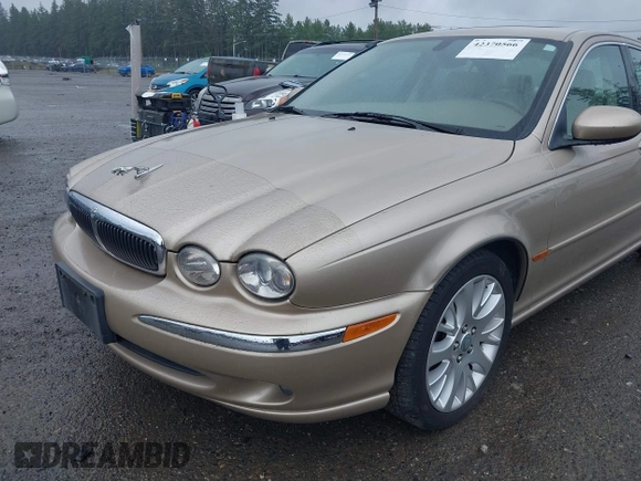 2003 Jaguar X-Type 2.5L Manual z VIN SAJEA51D53XC94089, wystawiony jako IAAI lot #42370566 z przebiegiem 81 687 mil mil oraz . Historia ofert i sprzedaży dostępna na DreamBid. Obrazek 6.