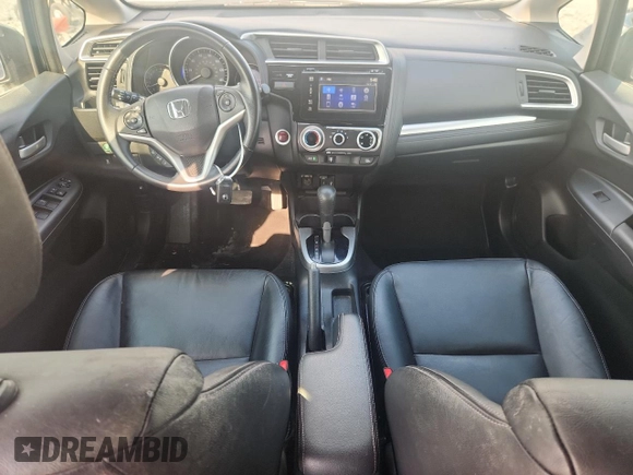 2015 Honda Fit EX-L with VIN 3HGGK5H87FM708737, listed as a Copart auction lot 64310745 with 90,446 mi miles and Salvage title. Bid and sale history available at DreamBid. Image 8.