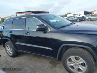 2014 Jeep Grand Cherokee Laredo with VIN 1C4RJFAG9EC516138, listed as a IAAI auction lot 42055214 with 135,701 mi miles. Bid and sale history available at carsss.com. Image 13.
