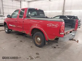 2000 Ford F-150 XL with VIN 1FTRX18L0YNA84231, listed as a IAAI auction lot 41824453 with 223,642 mi miles. Bid and sale history available at carsss.com. Image 3.