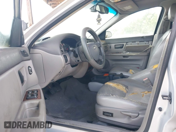 2005 Ford Taurus SEL with VIN 1FAFP56235A209879, listed as a IAAI auction lot 42537452 with 231,151 mi miles and . Bid and sale history available at DreamBid. Image 5.