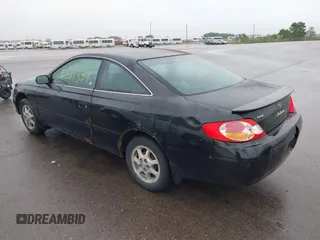 2003 Toyota Solara SE z VIN 2T1CE22P03C022496, wystawiony jako IAAI lot #42307339 z przebiegiem 162 994 mil mil oraz . Historia ofert i sprzedaży dostępna na DreamBid. Obrazek 3.