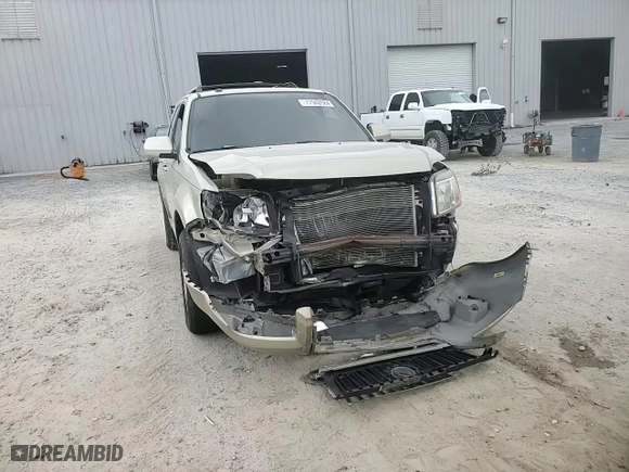 2010 Mercury Mariner Premier with VIN 4M2CN8H73AKJ06036, listed as a Copart auction lot 77542084 with 240,377 mi miles and Salvage Title. Bid and sale history available at carsss.com. Image 12.