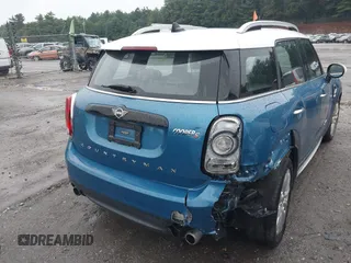 2019 MINI Countryman Cooper S with VIN WMZYT5C52K3G93902, listed as a IAAI auction lot 42650523 with 99,538 mi miles and . Bid and sale history available at DreamBid. Image 16.