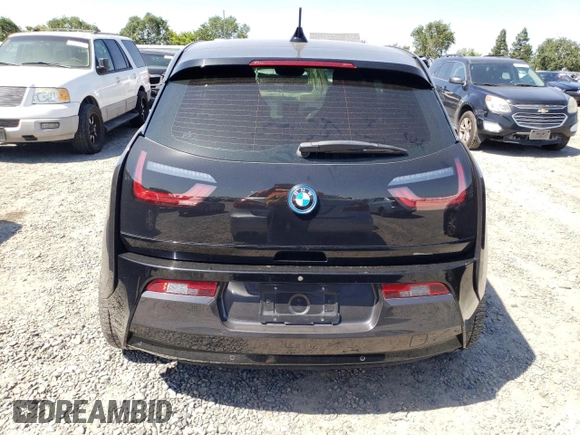 2015 BMW i3 z VIN WBY1Z4C5XFV278617, wystawiony jako Copart lot #54984645 z przebiegiem 140 868 mil mil oraz Tytuł czysty. Historia ofert i sprzedaży dostępna na DreamBid. Obrazek 6.
